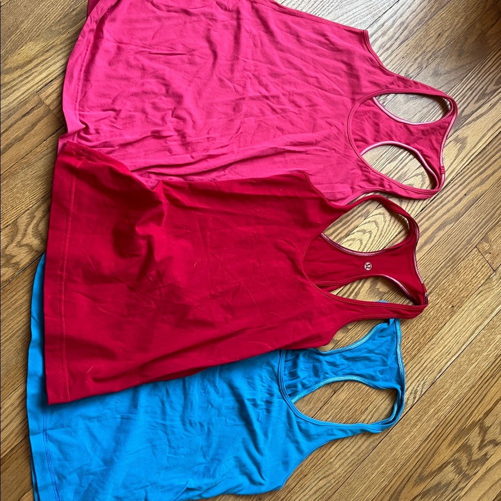 Bundle of 3 Lululemon Tank Tops, blue, red and pink, size 4